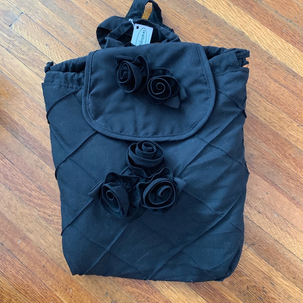 NWT black paddington back pack